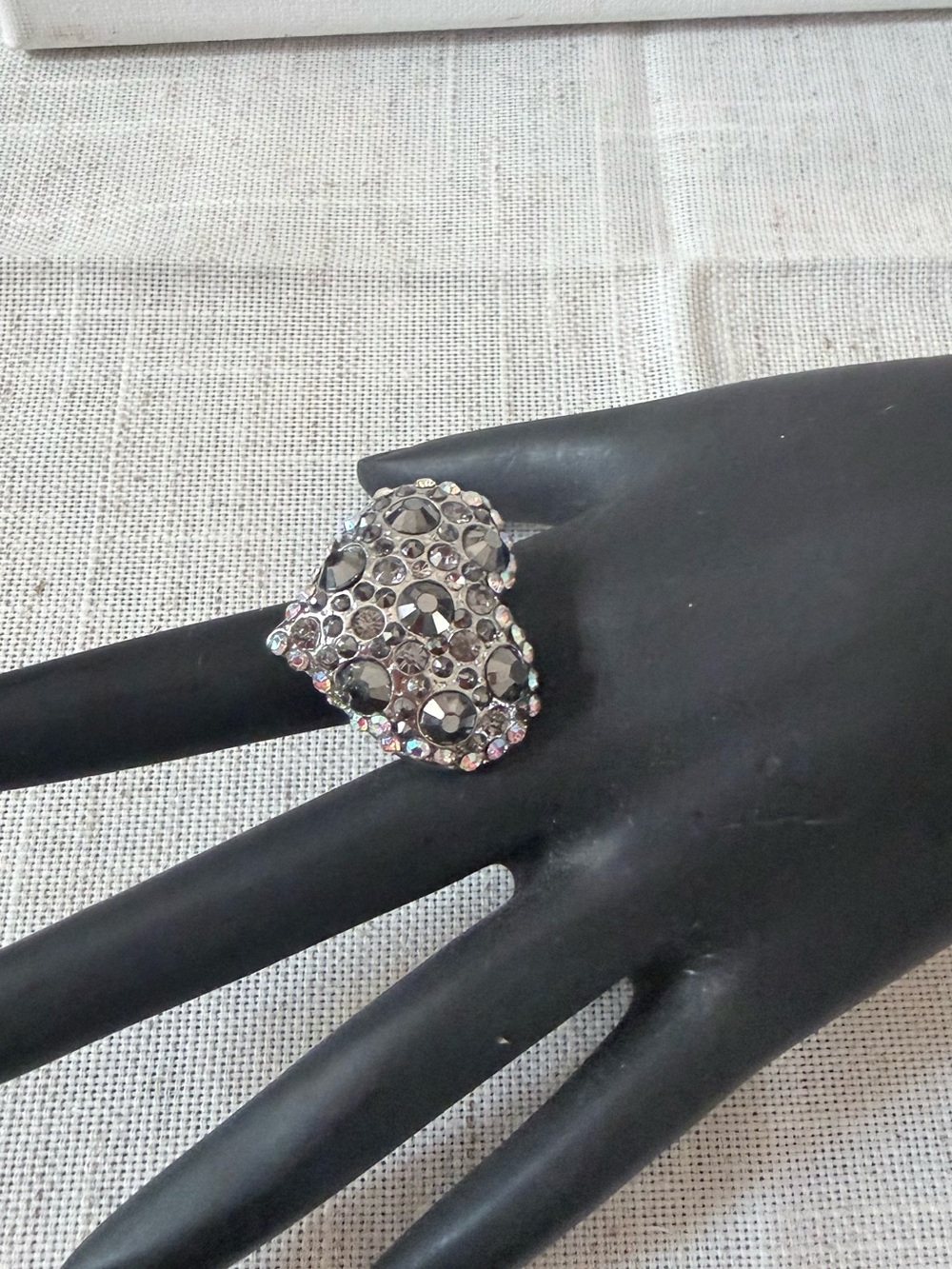 silver-tone puffy heart cocktail ring encrusted with an assortment of rhinestone